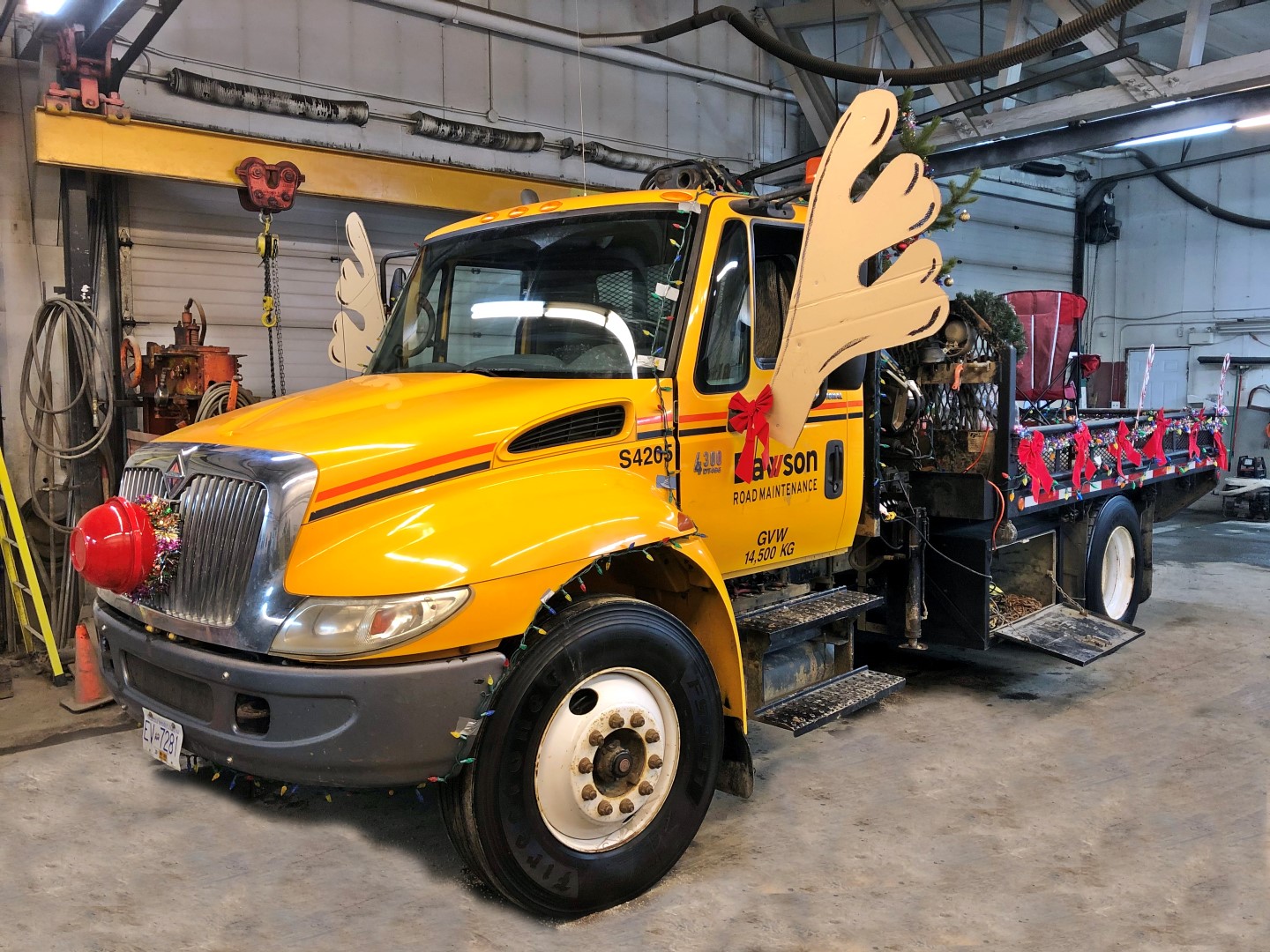Anahim Lake Crew get honour of driving Mr. & Mrs Clause through town