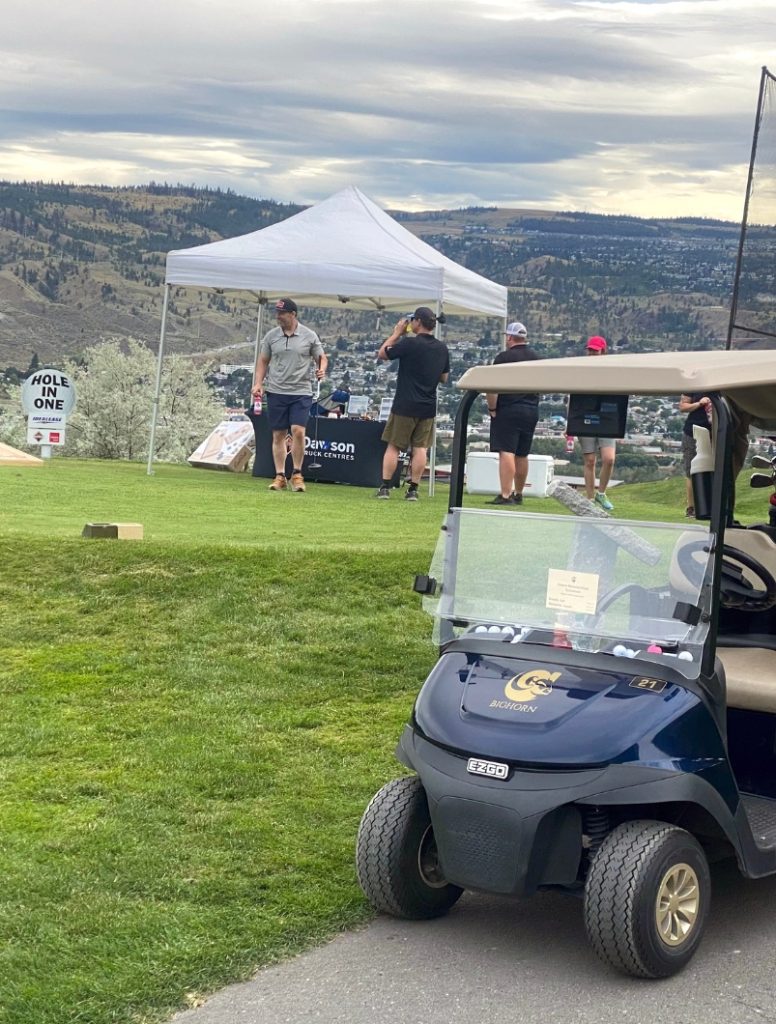 Dawson International Truck Centres booth at the Simpcw Resources Group Golf Tournament 10th hole